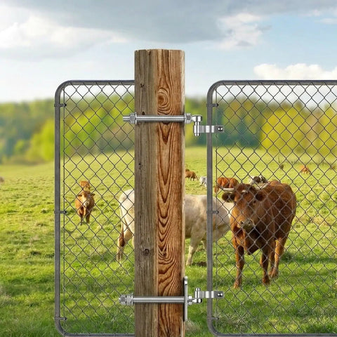 Stainless Steel Gate Hinge Heavy Duty Outdoor Attachment with eye plate on chain link fence in farm setting.