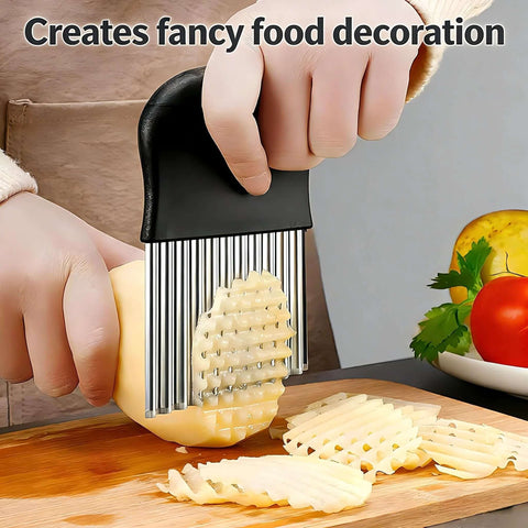 French fry slicer with black handle and stainless steel blades cutting a potato on a cutting board