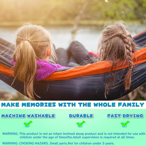 Two children in a Kids Hammock for Indoor Outdoor Play and Camping, Soft 210T Parachute Fabric, enjoying outdoor relaxation.