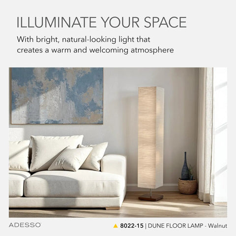 Three Light Floor Lamp With Natural Wood Base And Dimmable Brightness, satin steel accents, crinkle paper shade beside sofa