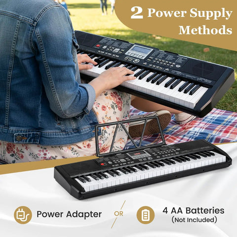 Person playing 61 Key Portable Keyboard Piano With Stand And Bench Lighted Keys 200 Rhythms And 200 Tones outdoors
