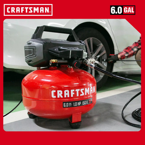 Craftsman 6 Gal Pancake Air Compressor With Oil-Free Tank Generating A Punchy 150 Psi For Swift Recovery, used for inflating car tires.