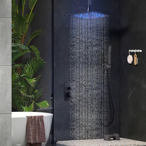 Top Shelf Ceiling Shower Faucet Set Featuring Handheld Sprayer And 12 Inch Led Rainfall Head in matte black, water cascading from 12" head.