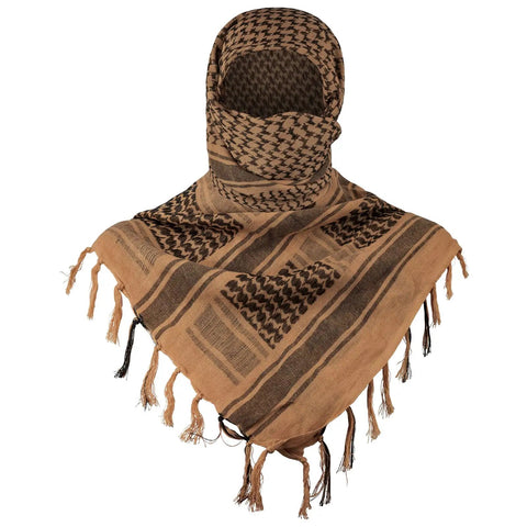 Military Style Shemagh Desert Scarf Wrap 100 Percent Cotton Keffiyeh Neck Headwear in desert tan worn as a head wrap.
