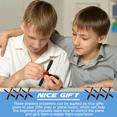 Two boys examining Three Pack Spare RC Plane Propellers for Mustang P51 400mm 4 Channel RC Aircraft, Four Blade Propellers With Saver Adapters And Red Nose