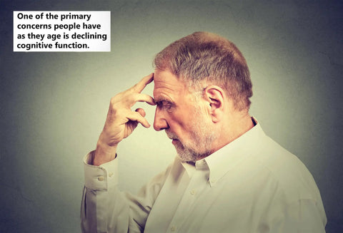 Older man deep in thought suggesting declining cognitive function with age.