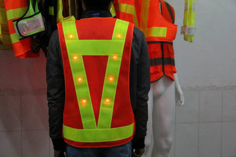 Keep It Lit And Stay Fly On The Streets With This Fresh 16 Led Reflective Safety Vest showing back view with orange mesh and yellow reflective straps.