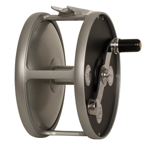 Side view of Cascapedia Fly Reel For Freshwater Trout And Two Handed Spey, Classic Clicker Ratchet, S Shaped Handle, English build.