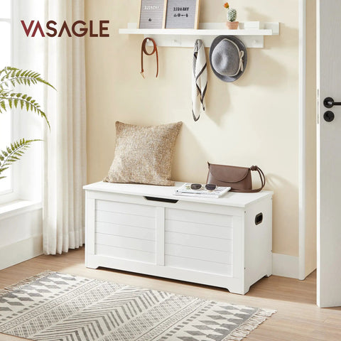 Big Capacity Storage Bench Seat With Reliable Dual Hinges Cozy Entryway Chest For Keeping Throw Blankets And Work Boots Under Tight Wraps. Large cloud white wood bench in living space with decorative pillow.