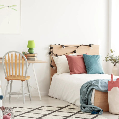 Bedroom setup with Yellow Mini Ceramic Globe Table Lamp With Matching Fabric Shade, cozy dorm vibe next to desk and bed.