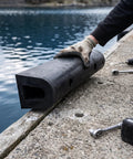 Beefy Heavy Duty Rubber Dock Bumper for Docks and Ships, D Type Fender Edge Guard being installed on pier