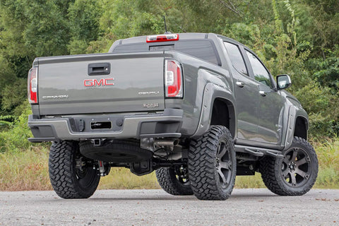 Lifted GMC truck showcasing suspension fit for N3 Rear Shock Absorbers Built Tough For Ford F150 2009 To 2024, 4 To 7.5 Inch Lift