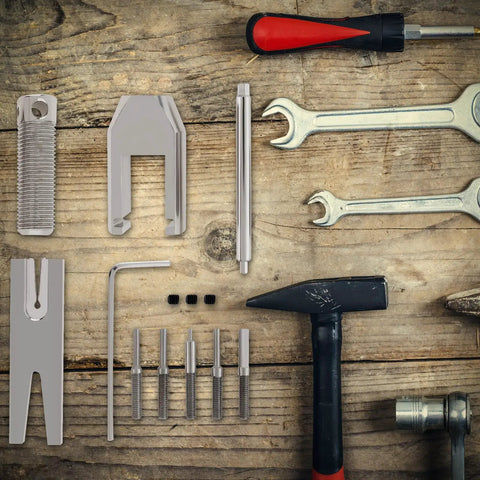 Pinion Gear Puller Remover Set For RC Motors And Vehicle Models With Five Pins on wooden surface, includes tools and accessories.