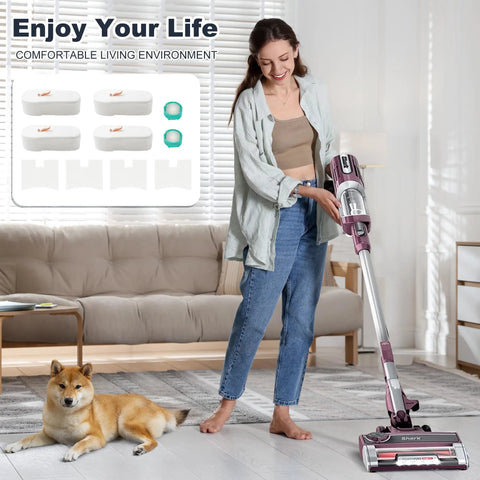 Woman using vacuum with HZ700 Replacement Filter Kit for PowerFins HairPro Odor Vacuum, dog on the floor, filter kit shown.