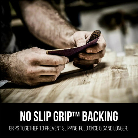Person holding Pro Grade No Slip Sandpaper Sheet 9 By 11 Inch 320 Grit For Woodworking And Finishing Durable Aluminum Oxide Paper