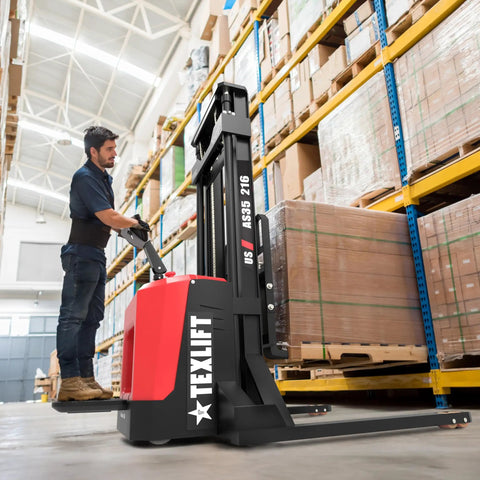 Hardcore Electric Pallet Stacker With Stand 3300 Lb Capacity 216 Inch Lift Height adjustable forks in warehouse.