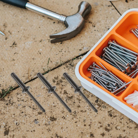 Heavy Duty Aluminum Blind Rivet Kit 20 Piece For Beefy Grip And Quick Fixes displayed with screws and hammer