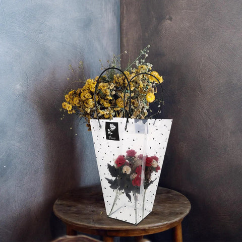 Plastic Flower Bouquet Tote Bag With Handy Handle For Floral Arrangements And Gift Packaging on wooden table