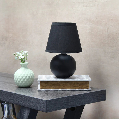 Mini Ceramic Globe Table Lamp With Matching Fabric Shade In Black Compact Desk Or Nightstand Light For Living Room Bedroom Or Dorm Perfect Accent Piece Uses 1 40W Equivalent E12 Bulb Not Included on a table