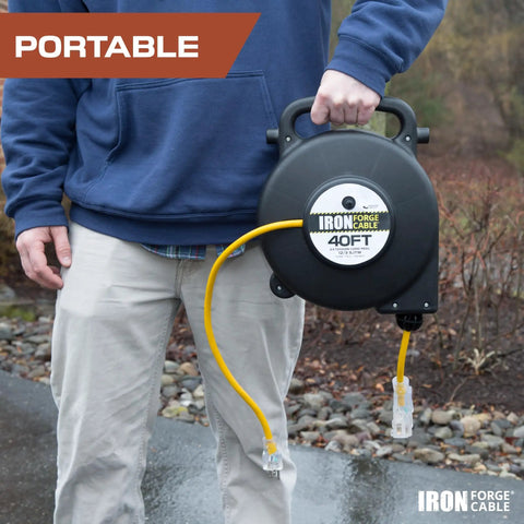 Man holding Heavy Duty Retractable Extension Cord Reel 40 Feet With 3 Outlets 12 Gauge SJTW 3 Prong Lighted Plug