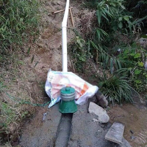 500W Micro Hydroelectric Water Turbine Generator Portable Power Station installed in a creek for outdoor renewable energy use