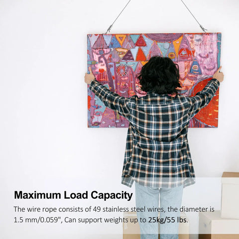 Person hanging art with Stainless Steel Picture Hanging Wire Kit, 25Kg Load, 2 Pack, Adjustable 2M Wire Rope With D Ring