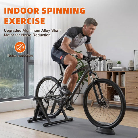 Man cycling on Indoor Bike Trainer Stand With Magnetic Resistance For Home Rides Fits 26 To 28 Inch And 700C Wheels