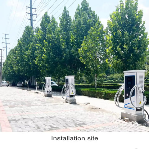 Heavy Duty EV Fast Charger With Kickin DC Fast Charging System and Rugged Steel Cabinet at installation site amidst trees.