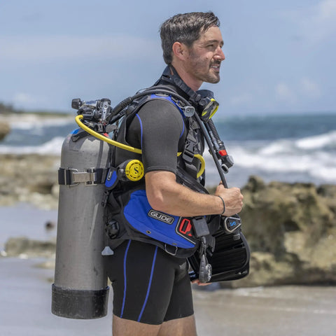 Man wearing Glide Front Adjustable Scuba BCD With Balanced Power Inflator For Recreational Diving All Day Comfort With Y Fit Shoulders