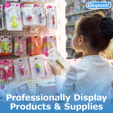 Child looking at pegboard display with assorted colorful packaged products in a store setting.