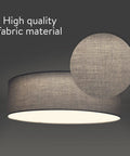Flush Mount Drum Ceiling Light With Remote Control, 12.6 Inch Diameter LED Fixture showing gray fabric texture close-up.
