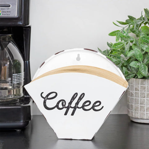 Enamelware Coffee Filter Holder Wall Mount Cone Shaped White Vintage Farmhouse Style Filter Storage Container With Distressed White Finish And Black Lettering For Classic Kitchen Organization displayed by a coffee maker