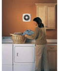 Laundry room with woman and Through The Wall Ventilation Fan With Built In Exterior Cap And On Off Switch For Home Use, 8 Inch Duct