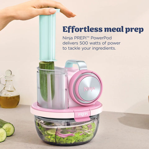 5 In 1 Kitchen Prep And Storage Bowl System Featuring Crinkle Slice And Shred Blades For Real Deal Meal Prep And Hosting Like A Champ With Secure Snap Lids, with cucumber being prepared.