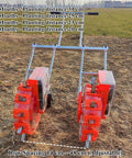 Double Row Hand Push Roller Seeder For Lawn And Garden, No Muss No Fuss Manual Seed Planter And Fertilizer Spreader on field