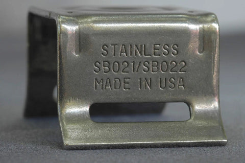 Close-up of Bull's Eye Stainless Steel Sign Mounting Brackets With Flared Leg, showing 3/4 Inch Slot and 'Made in USA' engraving.