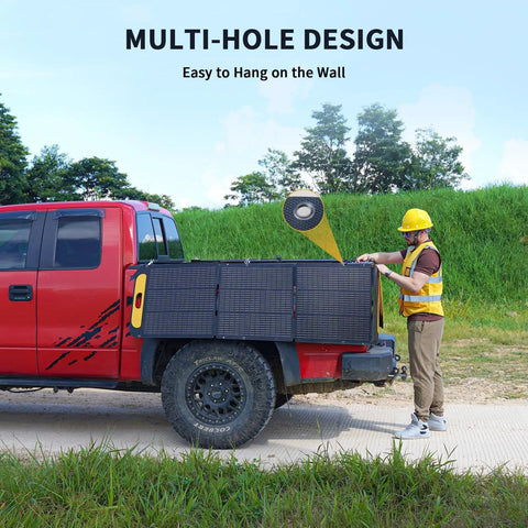 Person setting up 200W Foldable Solar Panel Kit With Stand For Power Stations on a truck, showcasing multi-hole design.