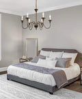 Bedroom with Six Light Farmhouse Chandelier In Oil Rubbed Brown And White Finish For Dining Room Living Room Foyer And Entryway A Rustic Chic Fixture With Timeless Vintage Luxury And Cozy Vibe hanging above bed