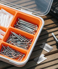 Heavy Duty Steel Strapping Clip With Iron Buckle, screws, anchors, and screwdriver on wooden table