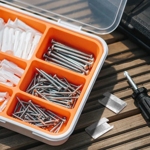 Divider box with screws, plastic anchors, and Heavy Duty Metal Banding Clip Buckle Set With Iron Seals For Packaging Strapping visible