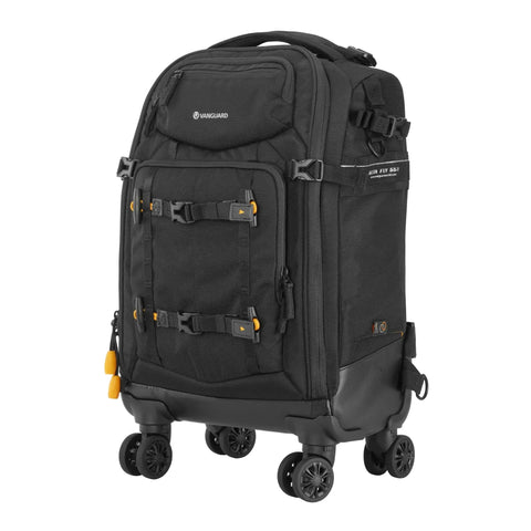 Eight Wheel Spinner Camera Backpack For DSLRs And Gear With Tuckaway Harness Converts To Everyday Pack, shown standing on wheels