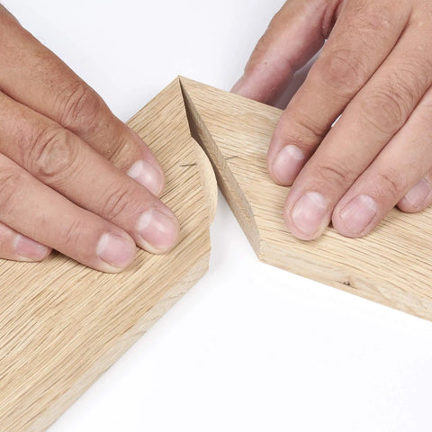 Hands aligning beechwood boards for assembly using Top Shelf Beechwood Joining Biscuits Pack Of One Hundred No Zero Size For Woodworking.