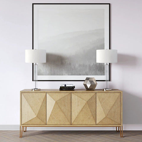 Tall 29 Inch Table Lamp With White Fabric Shade And Clear Glass Base In Polished Nickel Finish, Dope Sleek Cylindrical Vibe For Nightstands Desks Or Consoles, Long 6 Foot Cord Included on wooden console with geometric decor.
