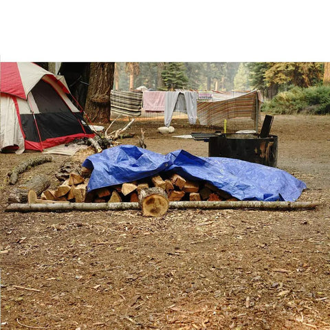 Beefy Heavy Duty Poly Tarp 6x8 Waterproof With Grommets Every 36 Inches 5 Mil Thick 8x8 Weave Blue covering firewood at campsite