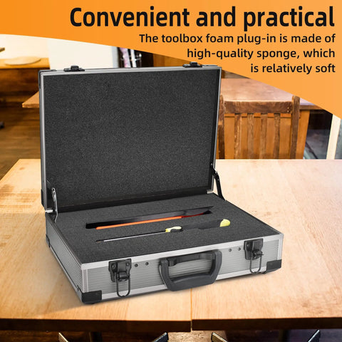 Black foam insert with pre-cut slots inside an open toolbox on a wooden table, showcasing product use.