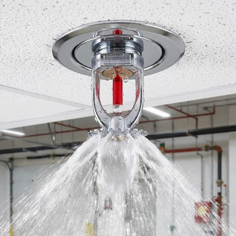 Score These Durable 10 Piece Fire Sprinkler Heads With Quick 155 Degree Activation And Reliable Half Inch Threading For Rock Solid Upright Water Spray Coverage Across Homes Workshops And Commercial Spaces, close-up of water spraying from a chrome fire sprinkler head.