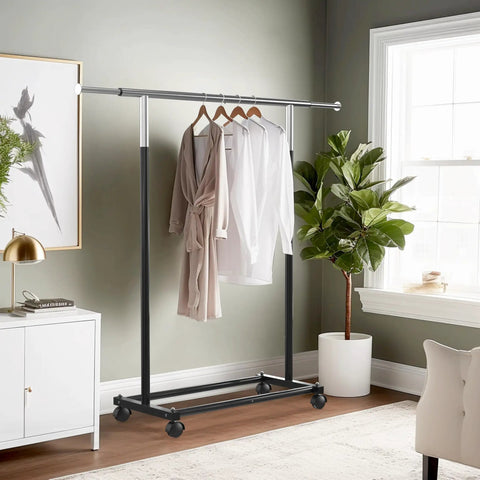 Heavy Duty Steel Clothing Rack With Extensible Top Rod And Chrome Accents In Slick Black Paint with hanging outfits.