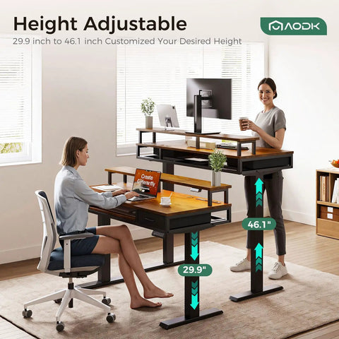 Two people using Electric Standing Desk With Drawers And Keyboard Tray, 55 Inch Height Adjustable Gaming Desk With Power Outlets And LED Lighting