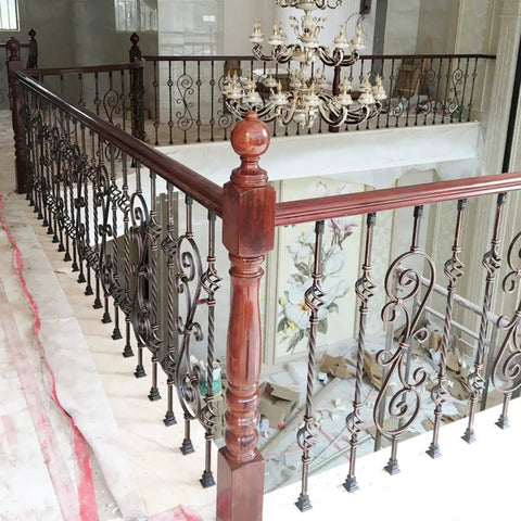 Heavy Duty Metal Staircase Balusters 6 Pack Adjustable Angle Railing Spindles for Deck and Porch installed with wooden railing.