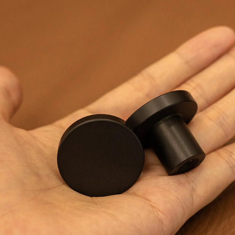 Top Shelf Matte Black Six Pack Round Cabinet Knobs And Drawer Pulls For Kitchen Cupboards Dressers Closets in hand, solid aluminum build.